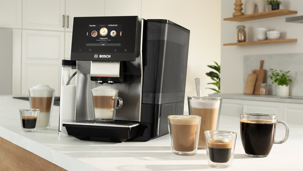 Bosch fully automatic coffee machine with cups of coffee